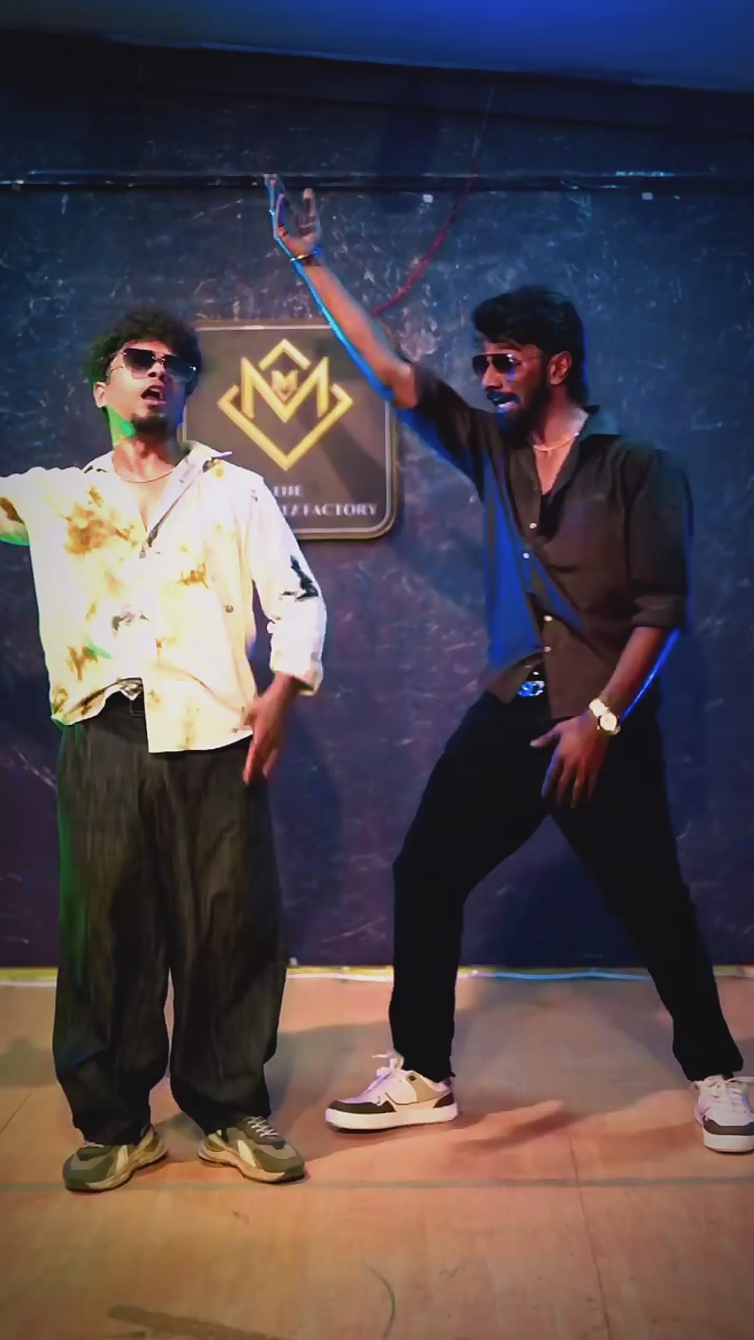 Adult dancers performing together inside Movementz
